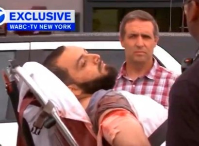 Bombing suspect Ahmad Khan Rahami being loaded into an ambulance after a shoot-out with police in Linden