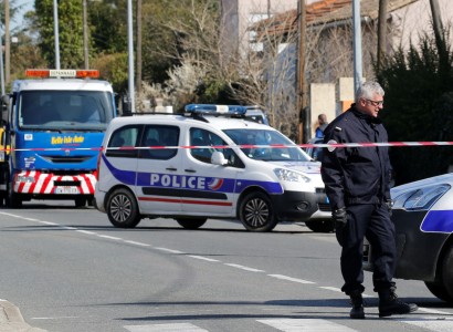 Three killed in France in shooting, supermarket hostage-taking