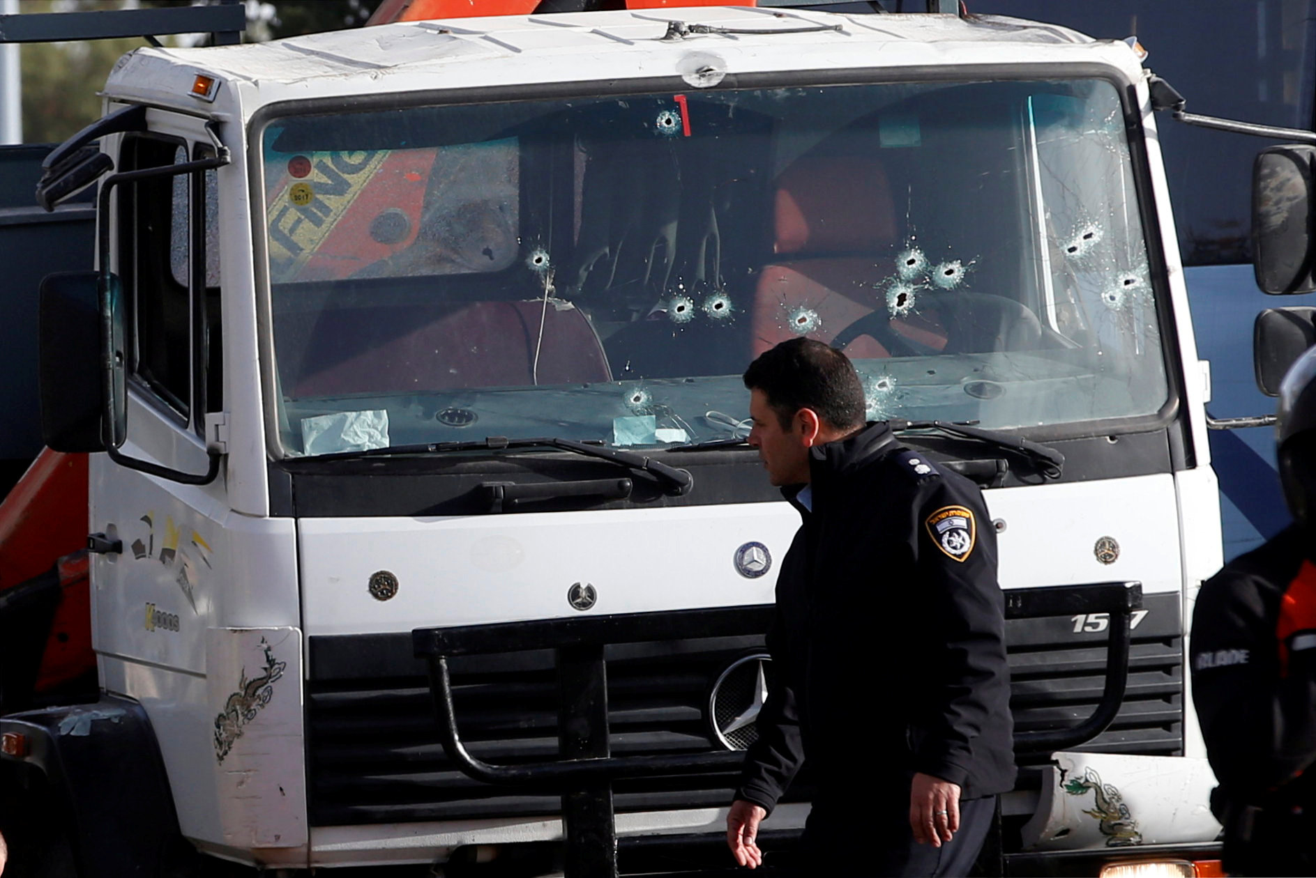 At least four dead in Palestinian truck attack in Jerusalem